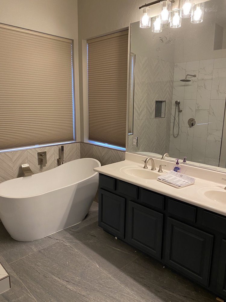 Freestanding tub with marble herringbone shower and double vanity — Bathroom Remodeling by Urban Element, Inc. in the East Valley of Arizona