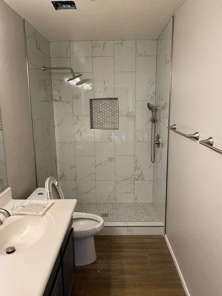 Marble tile walk in shower with hex niche — Bathroom Remodeling by Urban Element, Inc. in the East Valley of Arizona
