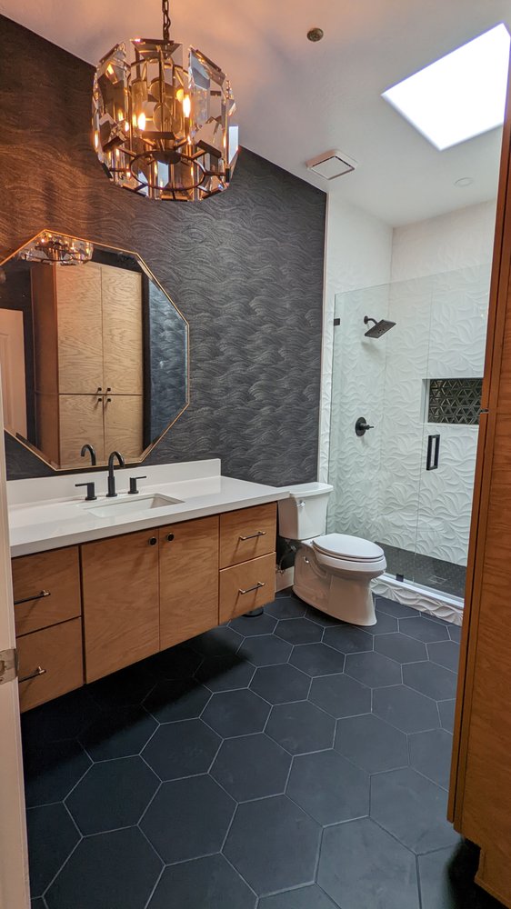 Master bathroom with floating wood vanity and textured tile — Bathroom Remodeling by Urban Element, Inc. in the East Valley of Arizona