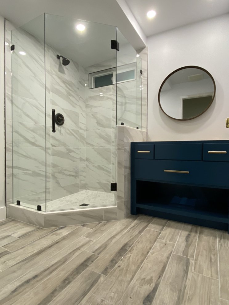 The natural look of porcelain tile gives this walk — Bathroom Remodeling by Urban Element, Inc. in the East Valley of Arizona