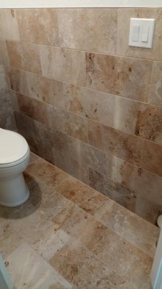 Tile wainscotting in separate restroom accomodates lightplate — Bathroom Remodeling by Urban Element, Inc. in the East Valley of Arizona