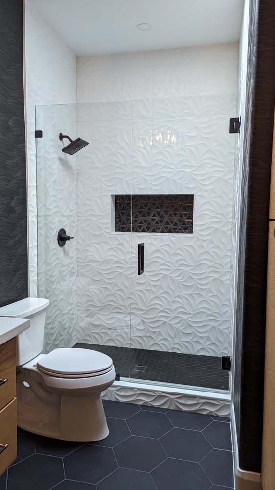 White textured tile walk in shower with black hex — Bathroom Remodeling by Urban Element, Inc. in the East Valley of Arizona