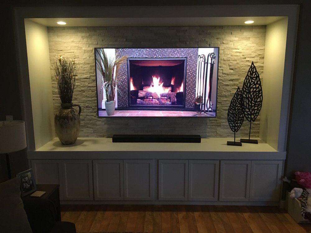 Custom entertainment center with led lighting and split face — Custom Designs by Urban Element, Inc. in the East Valley of Arizona