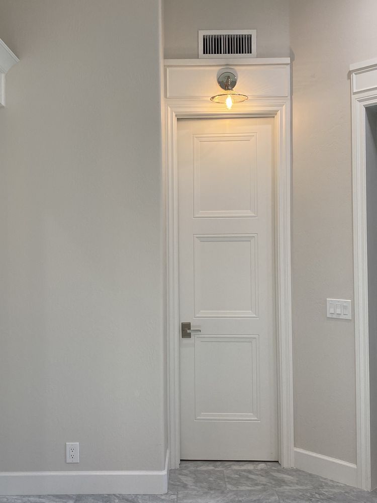 Custom molding detail above door with fun lighting — Custom Designs by Urban Element, Inc. in the East Valley of Arizona