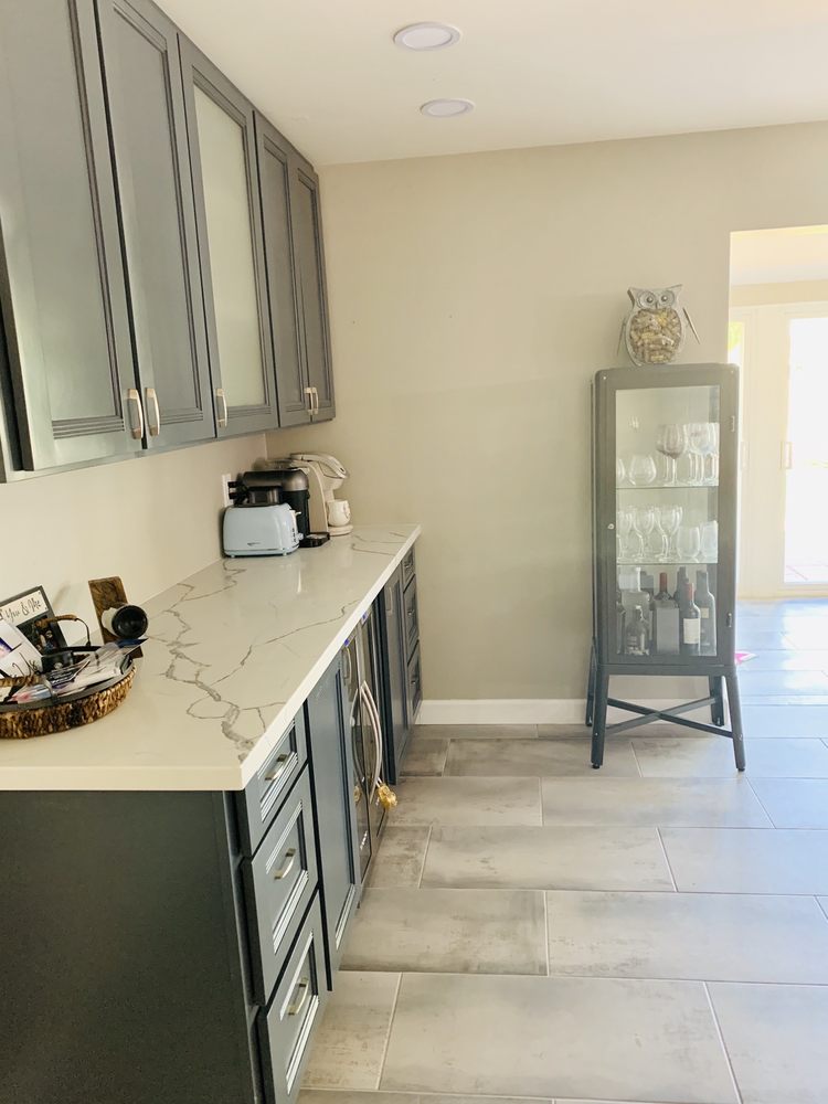 Grey shaker butler pantry with calacatta quartz counter — Kitchen Remodeling by Urban Element, Inc. in the East Valley of Arizona