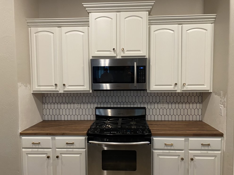 White painted kitchen cabinets with butcher block countertop — Kitchen Remodeling by Urban Element, Inc. in the East Valley of Arizona