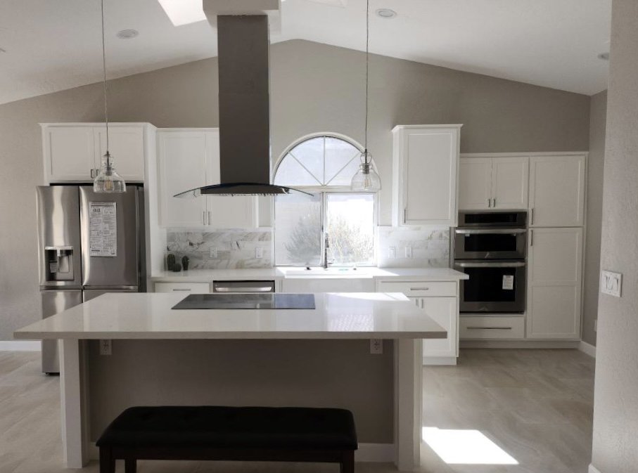 White shaker kitchen with quartz countertops and marble tile — Kitchen Remodeling by Urban Element, Inc. in the East Valley of Arizona